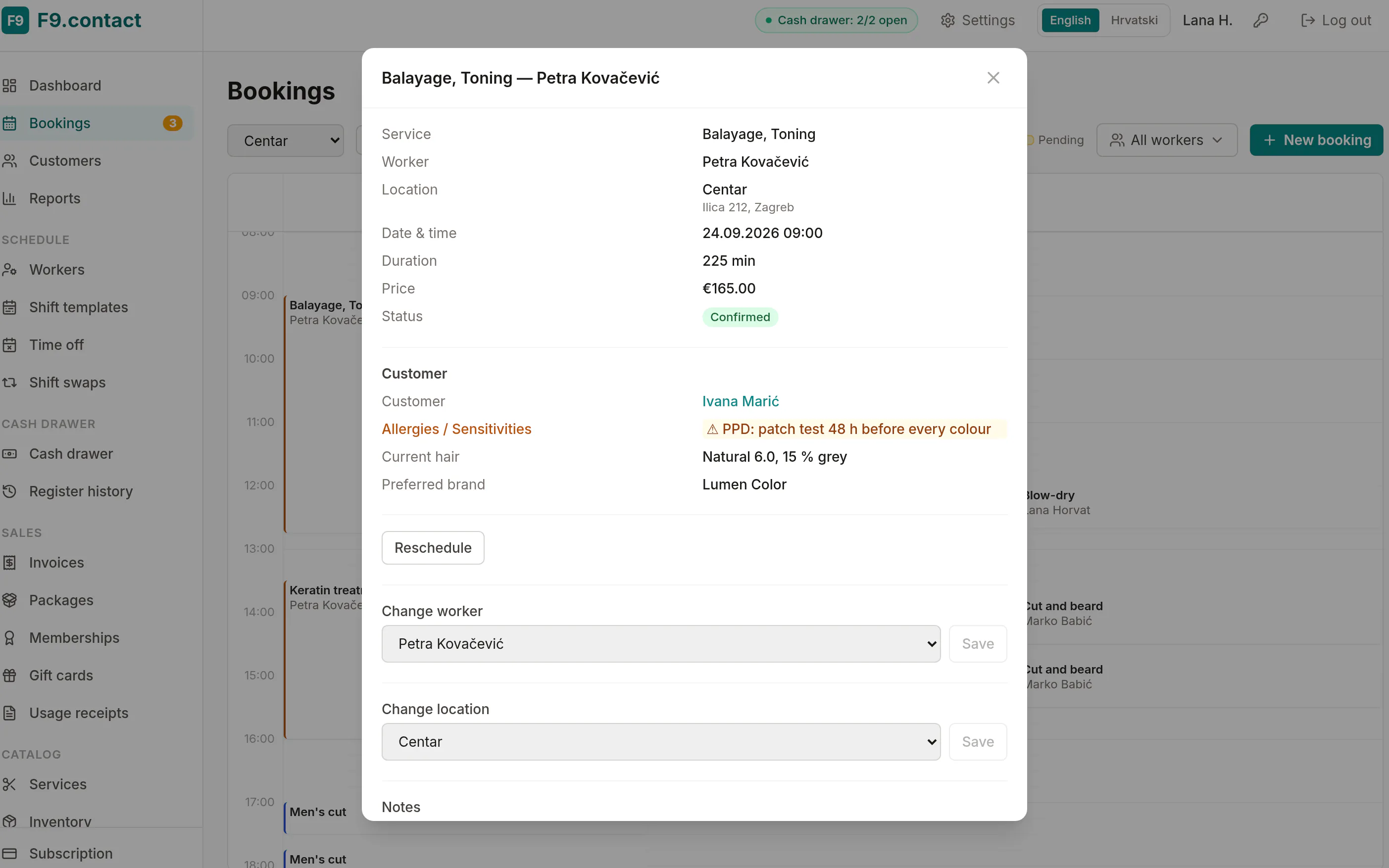 An appointment opened in the day view, showing the client's allergies and notes.